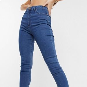 High rise skinny Jean .Midwash blue